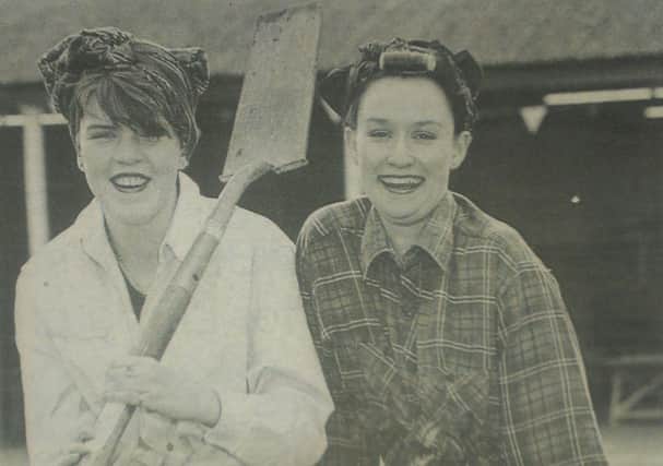 Larne's 1995 VE Day anniversary celebrations included a party in the Market Yard. Dressed as Land Girls were Sally and Joslyn Magill. INLT 19-625-CON