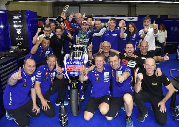 Ian Gilpin celibrates Jorge Lorenzo winning the Spanish GP. INLT 18-699-CON
