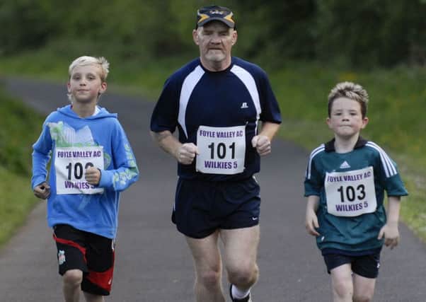 Damien, Damien snr and Cailin McDermott pictured taking part in the Wilkies Classic Run.