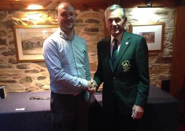 Andy Young pictured with Roe Park Captain Frank Boyd at the recent prize giving evening held in the Coach House.