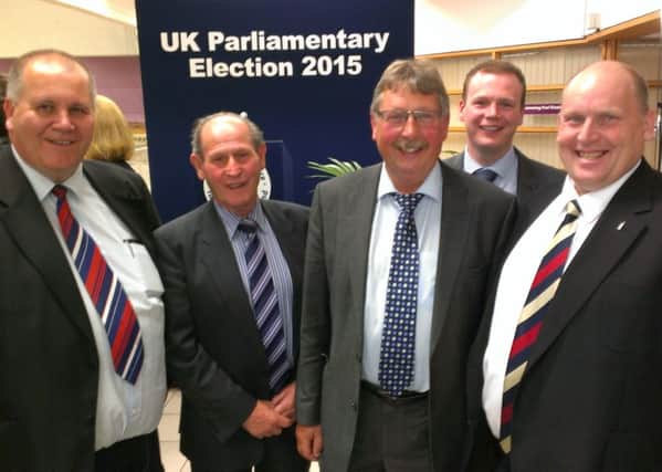 A very happy Sammy Wilson (centre) with members of his campaign team at the count in the Valley Leisure Centre. INNT 20-510CON