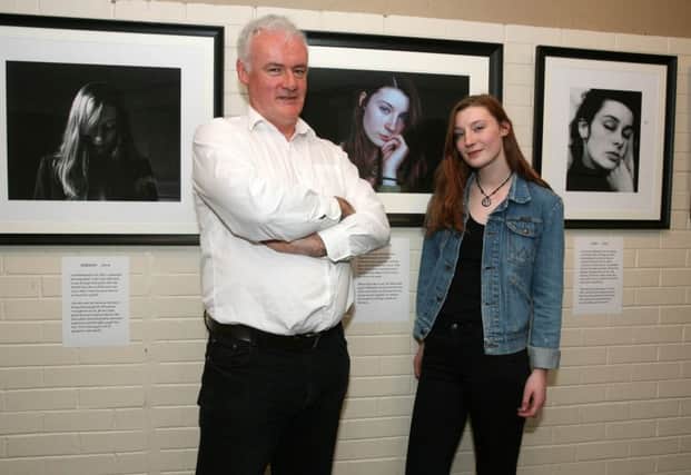 Stephen Price pictured at the opening evening of his photographic exhibition at the Riverside Theatre with Rebecca McLaughlin, who is one of the portraits on display. INCR20-306PL