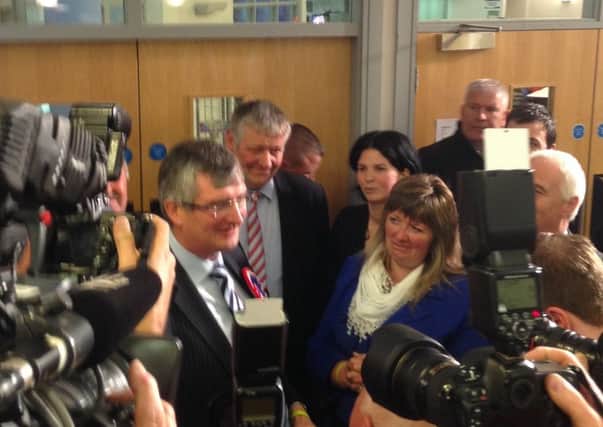 Tom Elliott is surrounded by well wishers including Dungannon DUP councillor Frances Burton and Kim Ashton
