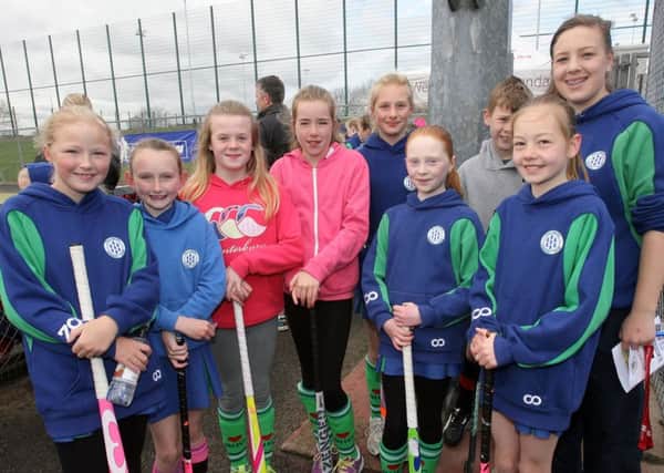 Lauren Burrows with the P6 section at the Ballymena Hockey Club junior tournament and funday. INBT18-237AC