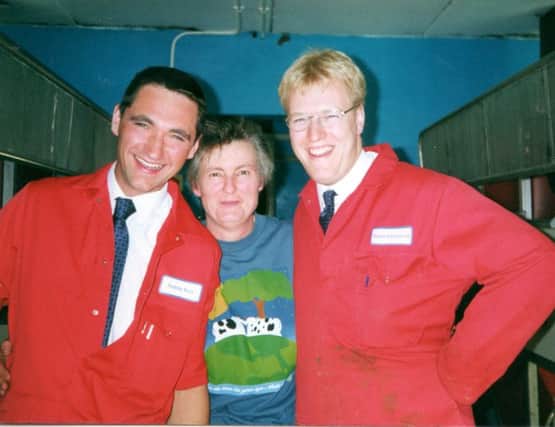 Looking back: Lely engineers Rodney Bond and Robert Glendinning pictured with Annie Watton from Ballybogey. The Watton family were the first farmers in Ireland to install two Lely A2 milking robots. INBM20-15 S