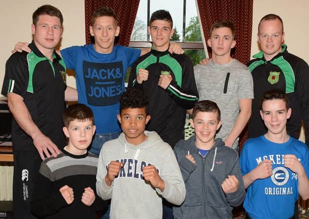 Boxers from All Saints along with club coaches pictured at their recent fight night in the Leighinmohr House Hotel. INBT20-256AC