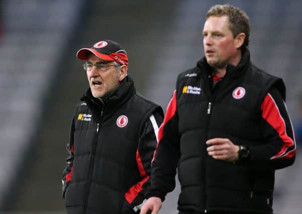 Tyrone manager Mickey Harte and assistant Gavin Devlin. ©INPHO/ Cathal Noonan