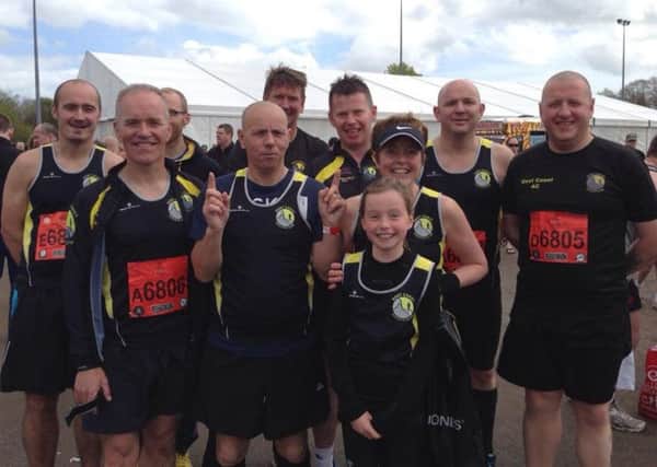 Members of East Coast Athletic Club's relay teams at the recent Belfast City Marathon. INLT 20-913-CON