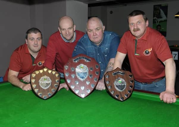 Robert Wilson, Bill McIlroy, Barney Hylands and Alex Irwin, Managers of Larne Pool League's A, B and Plate Teams who swept the board at the recent Inter League Champioship in St. Comgalls Club. INLT19-213-AM