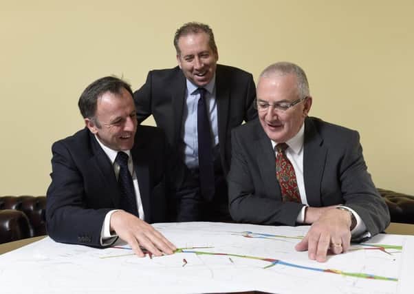 PRESS RELEASE IMAGE

12/5/15: Transport Minister, Danny Kennedy today announced that the contract for the development of the A6 Randalstown to Castledawson Dualling Project has been awarded to the Graham/Farrans Joint Venture.  Pictured with Transport Minister, Danny Kennedy (right) are John Wilson, Farrans (left) and Leo Martin, Graham Construction. Picture: Michael Cooper