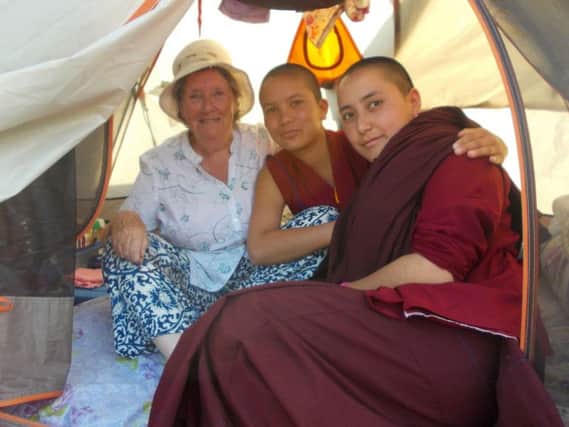 Islandmagee woman Marita Prendy pictured in her tent in Nepal with two nuns from the Druk Amitabha Mountain DGK nunnery outside Kathmandhu. INLT-20-727-con