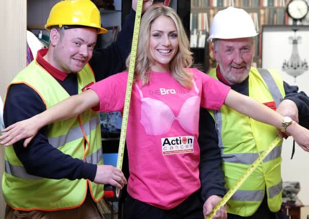 Model Jenny Curran along with Mark and Brendan Dowds from Dowds Kitchens and Bedrooms (DKB), pictured in the Lisburn Action Cancer Boutique measure-up and show their support as one of the sponsors of The Bra Walk, Action Cancers 10k walk in aid of the charitys life-saving breast screening service, at Belfast City Hall on Friday 05 June. Action Cancer urges you to bring your best bra, your walking shoes and bosom buddies and walk 10k this June! To register, visit www.actioncancer.org, contact Action Cancer on 028 9080 3344, or email thebrawalk@actioncancer.org.


©Brian Thompson Photography