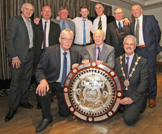 Players from the 1985 County Antrim Shield with Robert Andrews (centre back row), and Lisburn Distillery chairman Jim Greer, former manager Roy Welsh, and Councillor Thomas Beckett, Mayor of Lisburn and Castlereagh City Council (front row l-r). Picture - David Hunter.