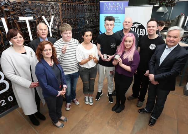 Level 3 Diploma in Art & Design students from the North West Regional College, Derry Campus, Jake McKenny, Jade Thompson, Dermot Sweeney, and Jenna Keys, who participated in the Live Client Brief for Walled City Brewery. Included are Seliena Coyle, Culture Craft, Deirdre Harte, Craft Development Officer, Derry and Strabane District Council, Basil Dalton, Head of School of Media & the Arts, NWRC, Alex Scott, ceramicist, James Huey, Walled City Brewery, and Colin McKeown, Irish Design.