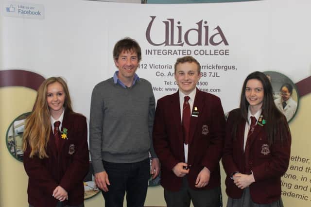 Journalist John-Paul Flintoff with Ulidia Integrated College prefects, (from left) Amy Buchanan, Thomas Adams and Anna Maguire. INCT 20-701-CON