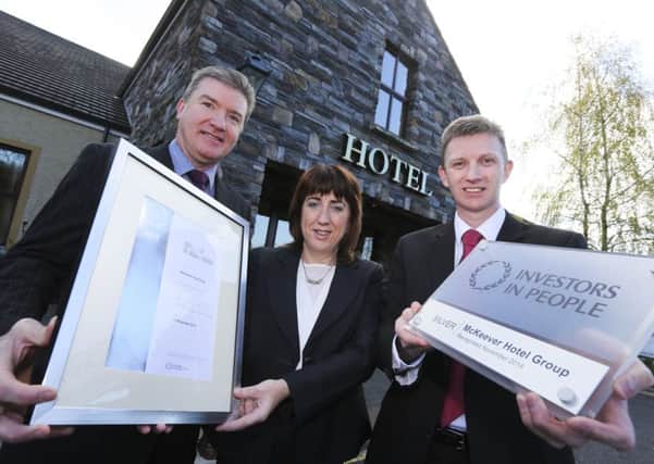 All three of the McKeever Hotel Groups Northern Ireland hotels have achieved Investors In People silver awards. Celebrating their success are Dunsilly Hotel General Manager Martin Boon, Adair Arms General Manager Stella Grant and Corrs Corner General Manager Martin Toner. INNT 21-501CON