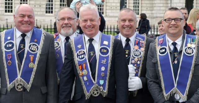 Some members of Sir Edward Carson Memorial LOL 1991 pictured against the backdrop of Belfast City Hall on Saturday 9th March at the Unionist Centenary Committee parade to mark the march past of Belfast City Hall by the 36th (Ulster) Division in May 1915.
 INUS2015-0760