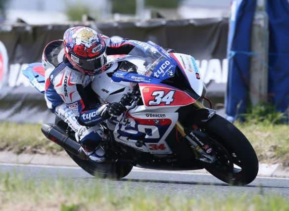 Alastair Seeley - (Tyco BMW Motorrad Racing BMW ) in action during today's practice session for this years Vauxhall International NW200 in Portrush.  Photo by David Maginnis/Pacemaker Press
