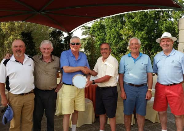 City of Derry President, Maurice Quigg (third from the right), presents the Travellers' Trophy Salver to 2015 winner Eugene Dunbar (North-West). Also in the picture are Stephen Wray (Portadown), Brendan Coyle (North West), Andy Meenagh, Tournament Organiser and Willie Barrett Tournament Official.