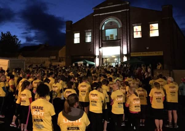 Crowds gather in Cookstown for the Darkness Into Light event