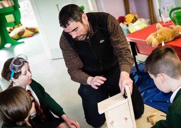 St Macnissi's schoolkids learn how to construct habitats for birds and bats. INLT-20-711-con