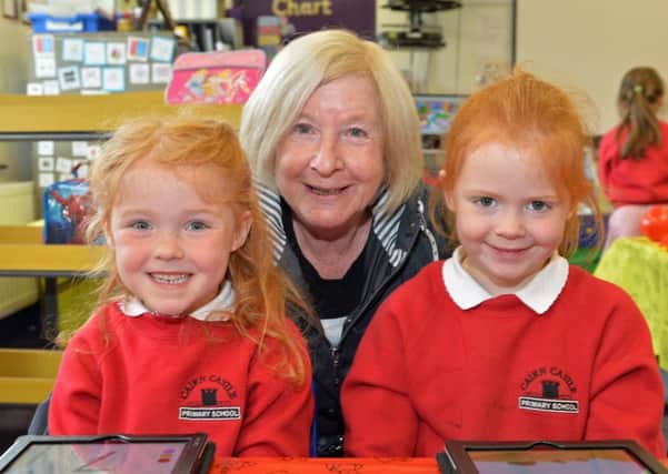 Margaret Blair is pictured with grandaughter Molly Blair (left) and class mate, Sienna Neil during Grandparents Day in Cairncastle Primary School. INLT 20-007-PSB