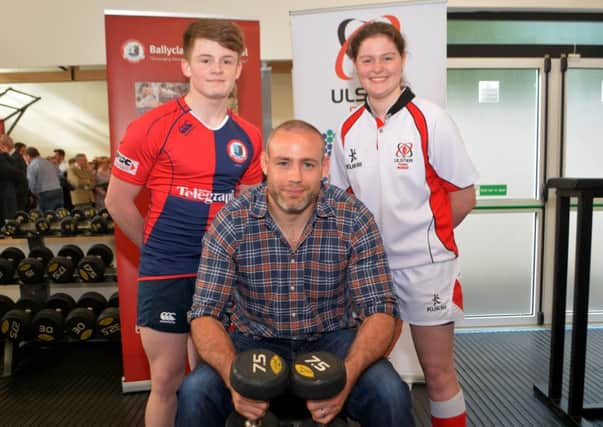 Ulster Rugby star Lewis Stevenson with Ballyclare High pupils Jake McVicker and Storm Cobain at the opening of the brand new strength and conditioning gym at the school. INNT 20-001-GR