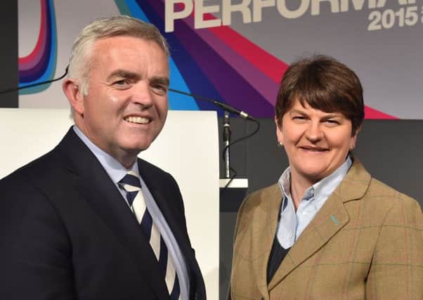 New Enterprise, Trade and Investment Minister Jonathan Bellwith former position holder Minister Arlene Foster