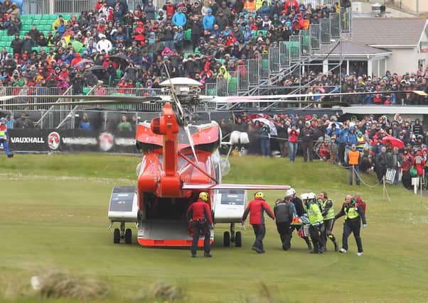 PACEMAKER BELFAST  16/05/2015
A female spectator is air lifted to the Royal Victoria Hospital after being injured during a crash incident in todays superstock race at the North west 200 road races.
Photo Tremaine Gregg/Pacemaker Press