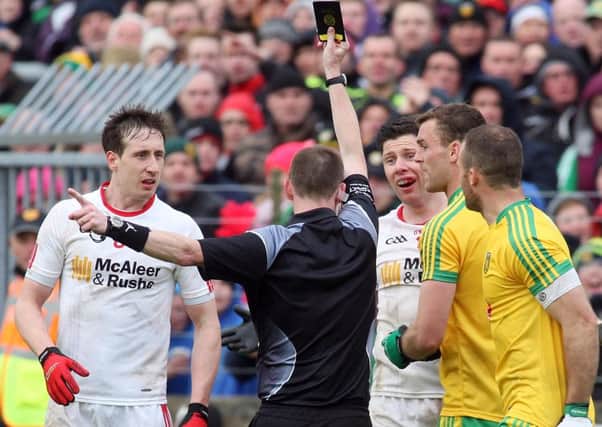 Donegal vs Tyrone

Tyrone captain Sean Kavanagh receiving a second booking from match referee Joe McQuillan.

Mandatory Credit Photo Lorcan Doherty / Presseye.com