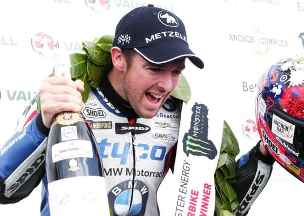 Standing in the Hall of Fame: Alastair Seeley won three races at this year's North West 200 to equal Robert Dunlop's all-time record of 15 victories at the international road racing event. INLT 21-929-CON