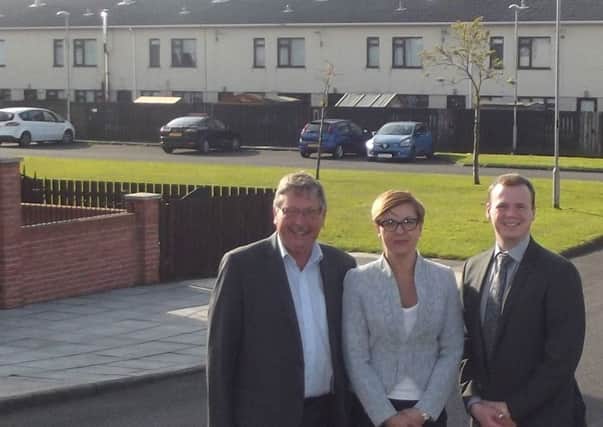 DUP representatives Sammy Wilson MP and MLA, Norma Allen and Councillor Gordon Lyons have welcomed an assurance by the Housing Executive over the inclusion of Wellington Green in an external maintenance scheme. INLT 20-653-CON