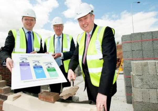 (From left): Cameron Watt, chief executive of NIFHA, with the chairman of the Housing Executive Donald Hoodless and Minister Mervyn Storey, announce the latest development figures. INLT 20-656-CON