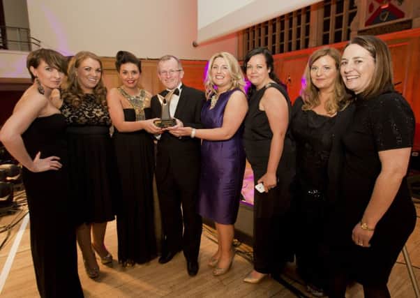 The 37th Annual Tourism NI awards have recognised the most inspirational local providers and performers and celebrates the success of the tourism industry over the last year. Pictured are Niall Gibbons of Tourism Ireland, with (l-r) Helena Hasson, Karen Leonard, Elisha McCallion, Linda Williams, Mary Blake, Jacqueline Whoriskey and Aedin McCarter of LegenDerry Maritime festival, winner of the Best Event or Festival Experience award. Picture by Brian Morrison.