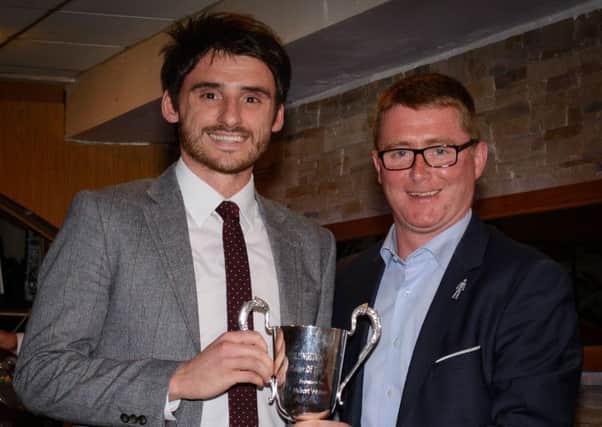 Aaron Moffett (left) was named the firsts' Player Of The Year winner. Making the presentation is Darren Murphy (right). Pic by JT Photography.