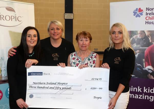 Janice Cooper, Corrinea Maclean and Wendy Brown from Tropic present a cheque for   to Maureen Giles of the Ballymena Support Group of Northern Ireland Hospice. The money was raised at a Ladies Pamper Evening in Galgorm Community Centre. INBT 18-103JC