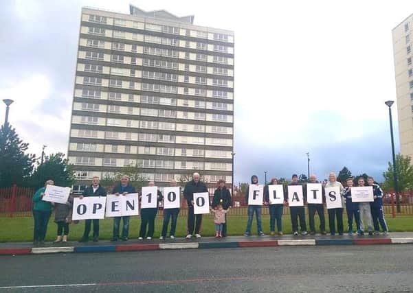 Rathcoole residents call on the Housing Executive to rent out nearly 100 flats in the estate that have been lying empty for several years. INNT 21-521CON