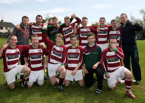 Celebrations from Cushendall after winning the Paddy Dunlop Cup for the Third Division play off. INBT22-277AC