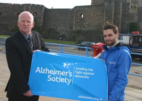 Councillor Billy Ashe, mayor of Mid and East Antrim Borough Council (left) and Andy Boal, Alzheimer Society's community fundraiser. INLT 20-659-CON