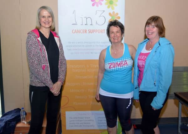 Karen McMeekan (centre), organiser of the the Zumbathon in aid of 1 in 3 Cancer Support.  INCT 20-043-GR