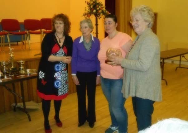 Knockagh Area Women's Institute held their spring meeting recently in Templepatrick Presbyterian Church Halls.  Pictured is the newly appointed executive representative, Diana Thompson, with award winners.  INCT 19-732-CON