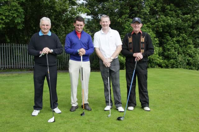 Lambeg's Jimmy Bruen captain Craig Tiffen (second left) alongside Tom Craig, Tommy Coulter, Tom Logan.