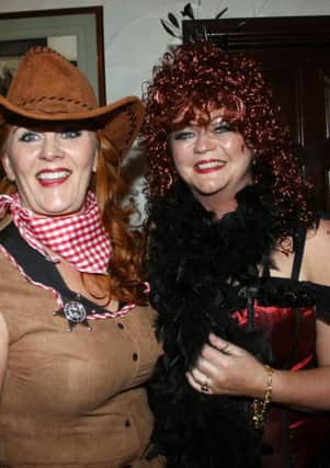 Fiona Kennedy and Grainne McFerran all dressed up for the charity night at The Scenic.