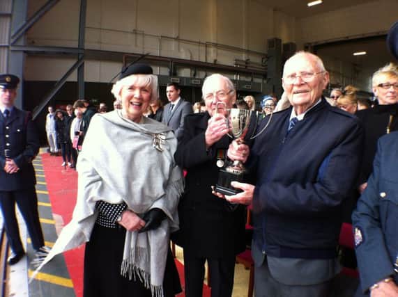 The Lord Lieutenant of Antrim, Mrs Joan Christie OBE, presents the Northern Ireland Aircrew Cup to (L) Dickie Spencer and (r) Bill Eames.