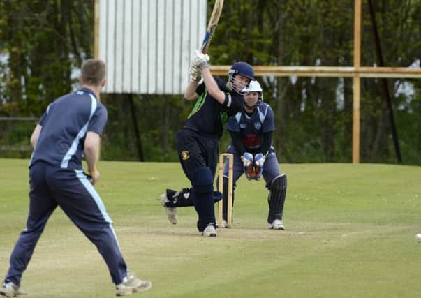 Andrew Fleming pictured at the crease for St. Johnston during Saturday's match against Carrickfergus. INLS2115-135KM