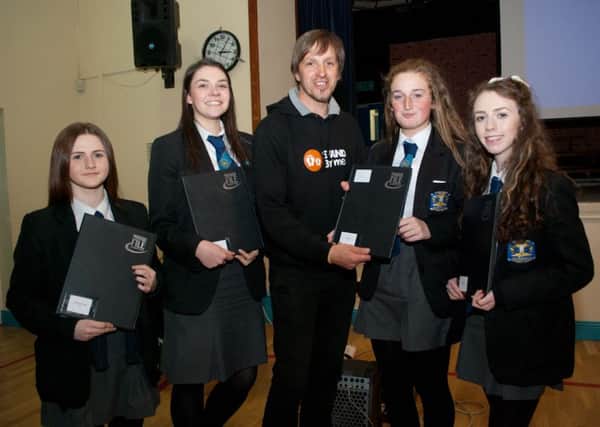 Sarah-Louise Boyd, Olivia Bell, Mr Bennett, Emma Porter, and Jamie Lyttle at the special assembly.  INCT 20-724-CON