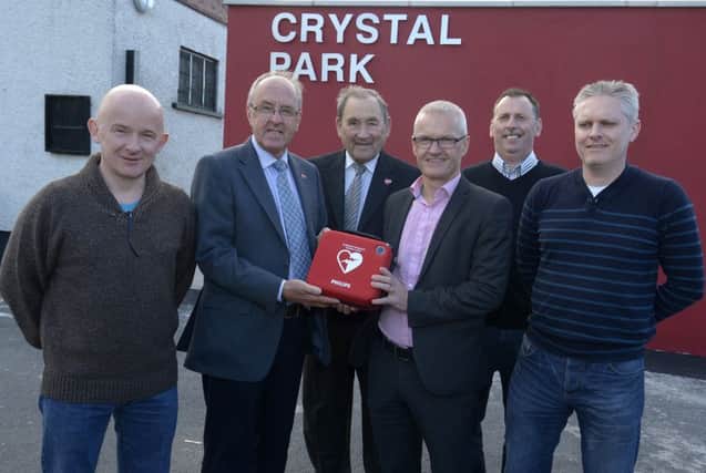 On behalf of Craigavon Cardiac Care Association, Hon Secretary Rodney Wiggins and Assistant Secretary Cyril  Totten presented a defibrillator to Banbridge Town FC President Andrew Cully,  Vice Chairman Dominic Downey, Manager Ryan Watson and Treasurer John Houston ©Edward Byrne Photography INBL1520-203EB