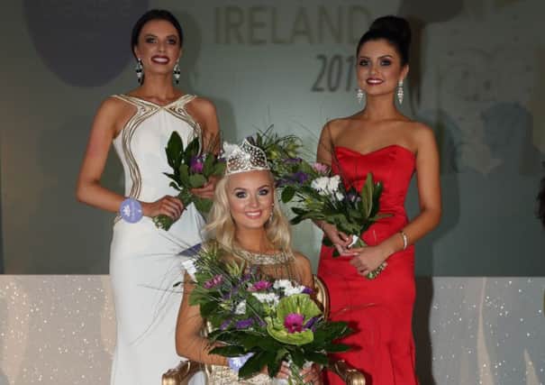 Ballymena girl Amy Fry (back left) who took third place in the 2015 Therapie Miss Northern Ireland contest pictured with winner Leanne McDowell (19)  from Cookstown (seated) and second placed Aimee Kirk, aged 17  from Eglinton (back right). Twenty-eight finalists from across Northern Ireland took part in the final, organised by top modelling agency ACA Models. (Submitted Picture).