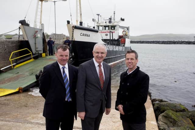 Press Eye Northern Ireland  - May 22nd 2015

Ministerial visit to Rathlin Island by Regional Development Minister Danny Kennedy to announce the award of the
new Rathlin Ferry contract Peter Rice Project manager for the Rathlin Ferry contract DRD, Regional Developemnt Minister Danndy Kennedy and Billy Tyrrell from Arklow Marine Services who have been awarded the 2.8 million contract to build a replacement car ferry for Rathlin Island.