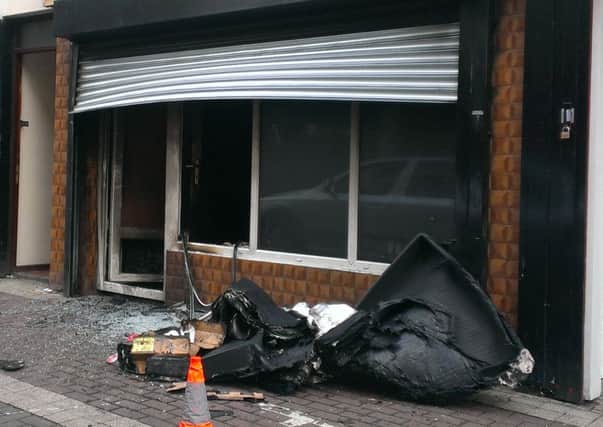 The Northern Lights shop in Dunluce Street, Larne, has been damaged by a second arson attack